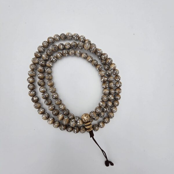 MALA TIBÉTAIN OS DE YAK GRAVÉ LES YEUX DE BOUDHA 8mm